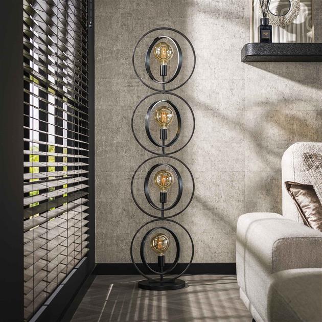 Vloerlamp Turn Around XL zwart metaal, vooraanzicht in een interieur