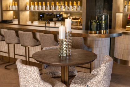 Bartafel Revelin donkerbruin metaal in een interieur