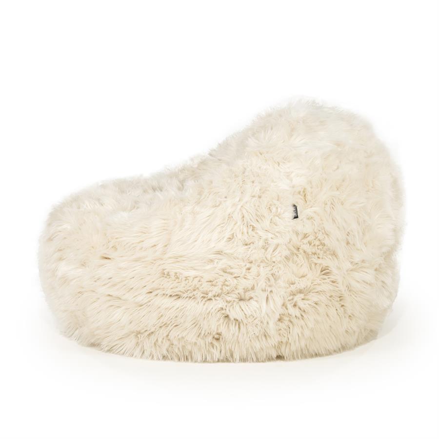 Fauteuil Snuzzle beige stof, zijaanzicht op witte achtergrond