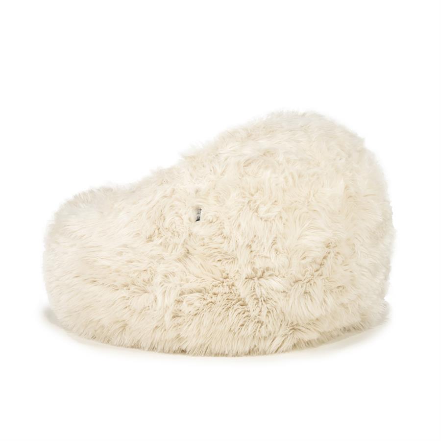 Fauteuil Snuzzle beige stof, schuin achteraanzicht op witte achtergrond
