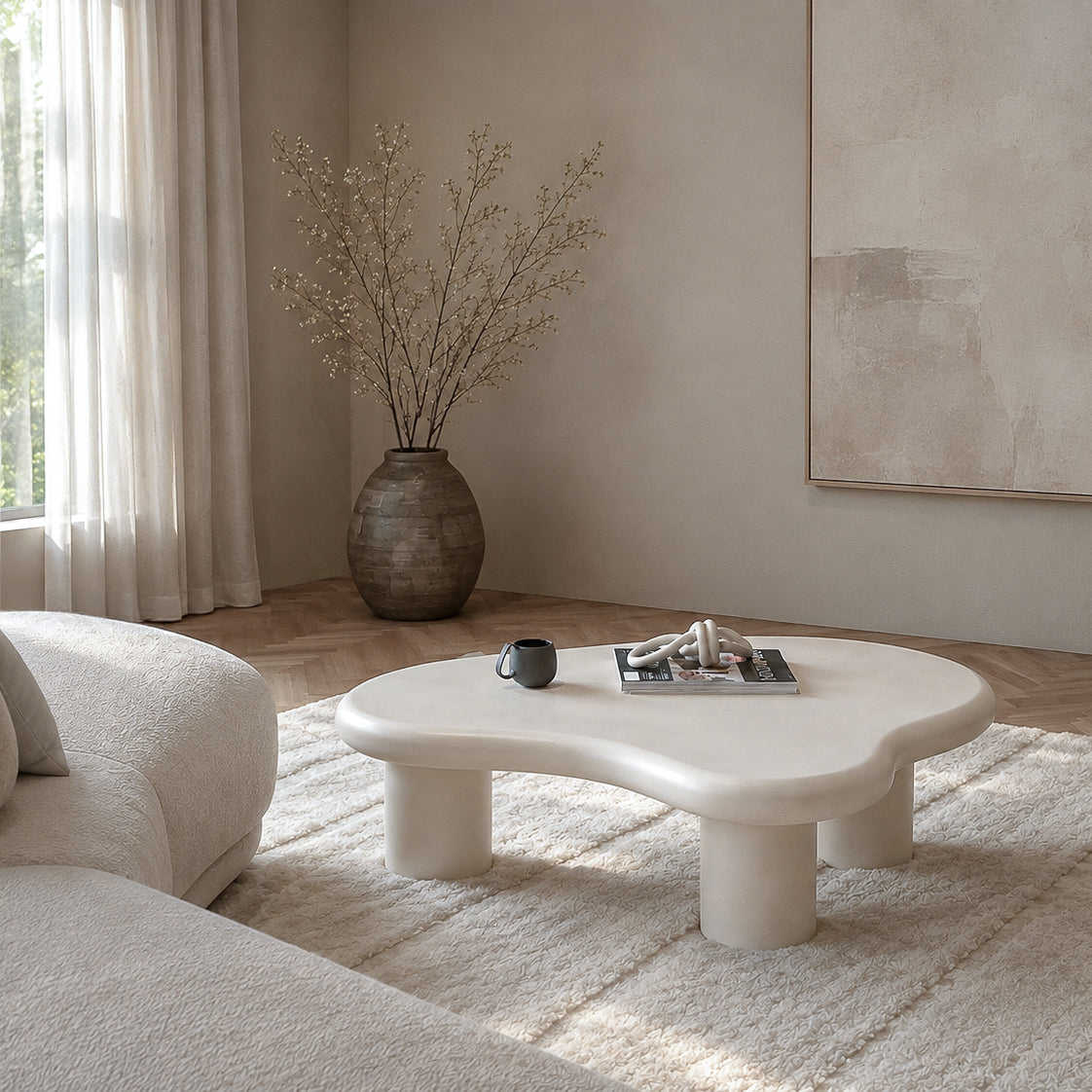 Salontafel Feline wit beton, vooraanzicht in een interieur