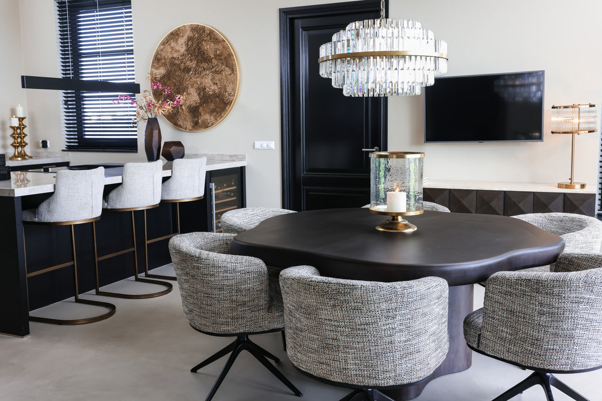 Eetkamerstoel Cheyenne grijs stof in een interieur
