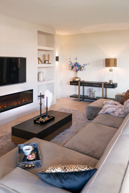 Salontafel Cambon bruin eikenhout in een interieur