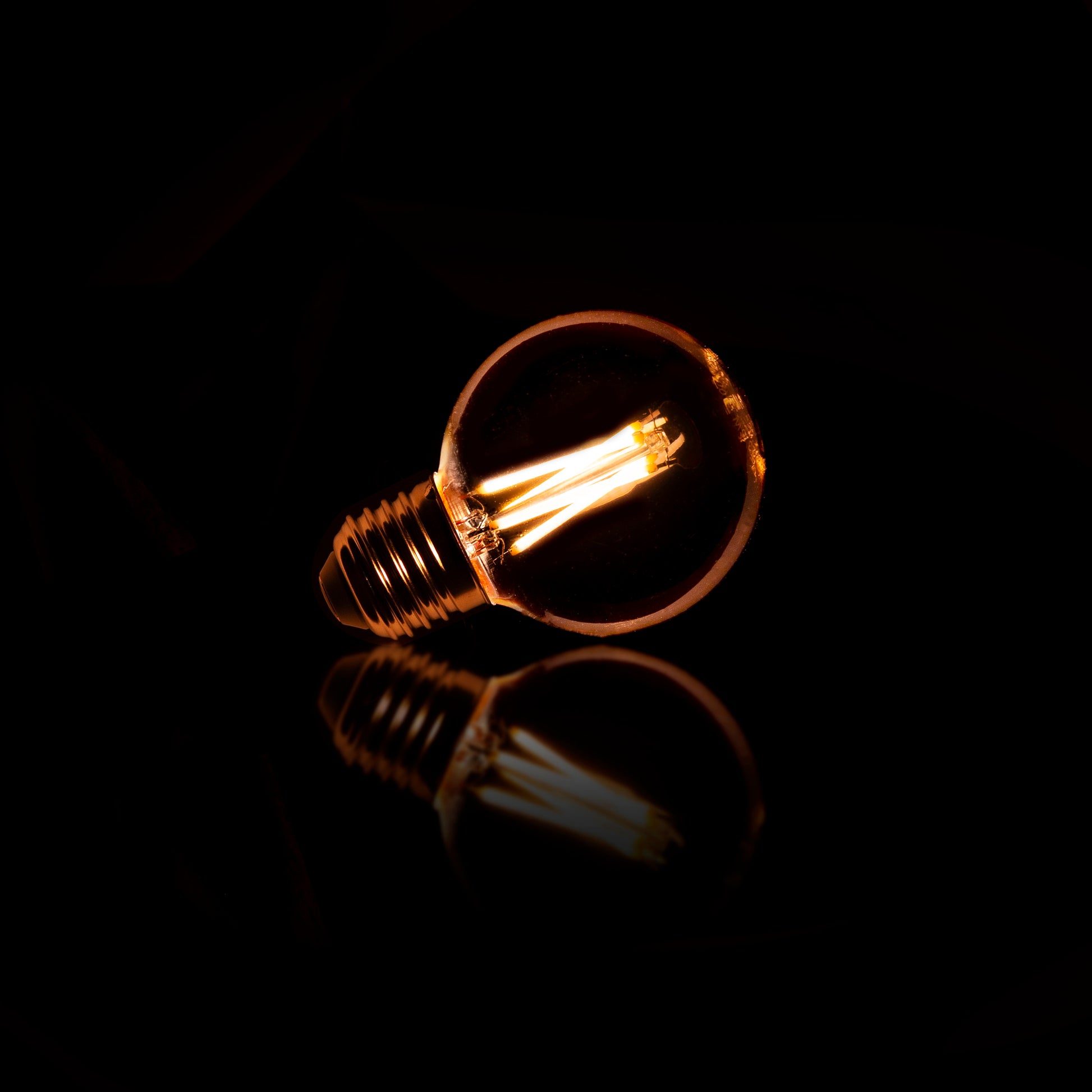 Lichtbron LED Filament Bol Ø6 | Amberkleurig Glas