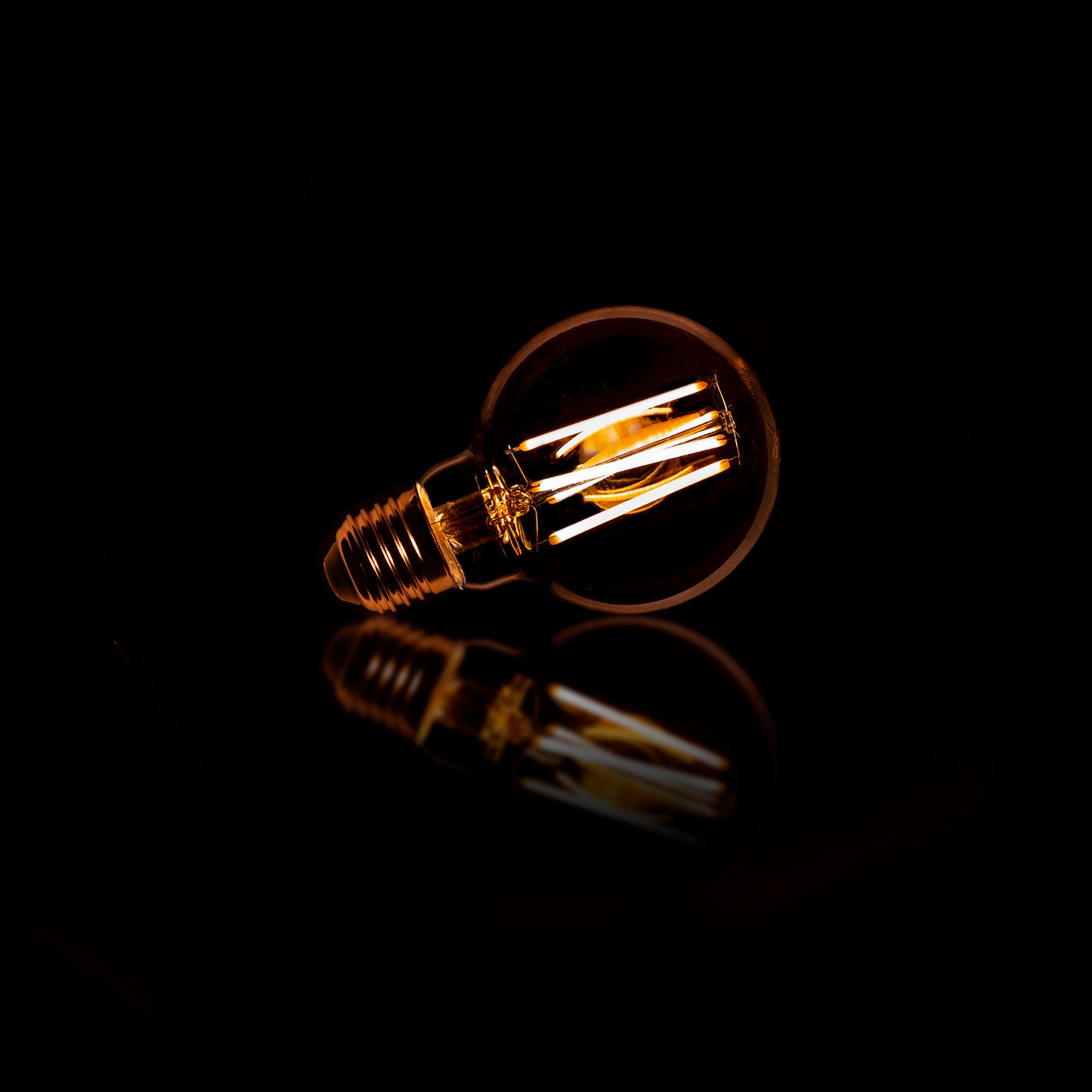 Lichtbron LED Filament Bol | Ø7 | Amberkleurig Glas