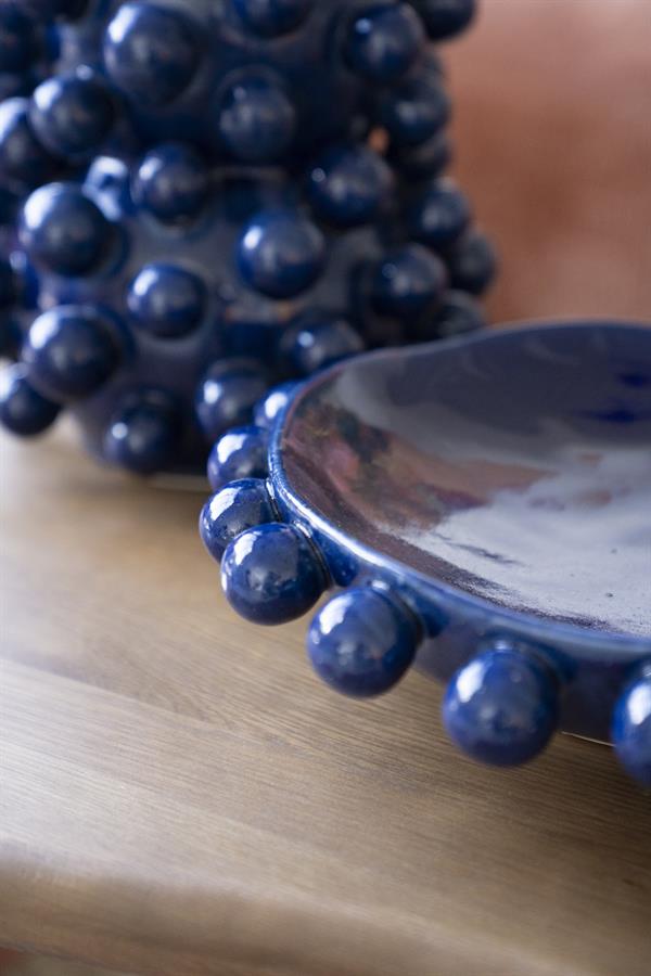 Schaal Viro blauw aardewerk, detail van het materiaal