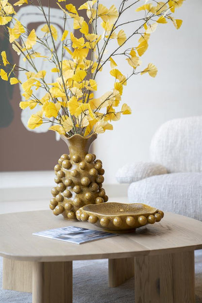 Vaas Viro geel aardewerk in een interieur