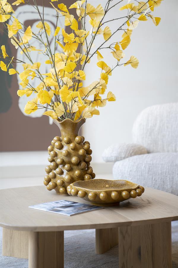 Schaal Viro geel aardewerk in een interieur