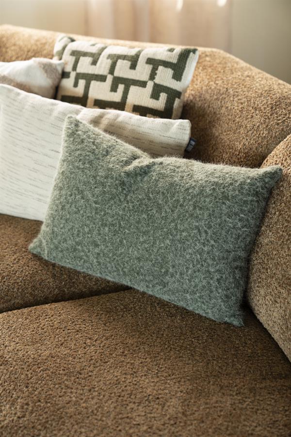Sierkussen Kelso groen polyester in een interieur