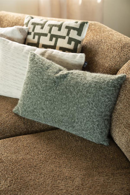 Sierkussen Kelso groen polyester in een interieur