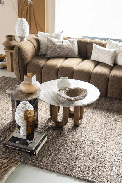 Salontafel LoopStone naturel mangohout, vooraanzicht in een interieur