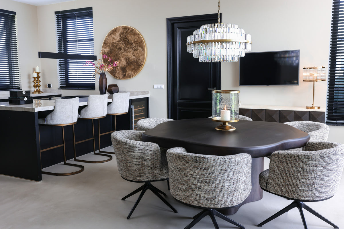 Eetkamerstoel Cheyenne grijs stof in een interieur