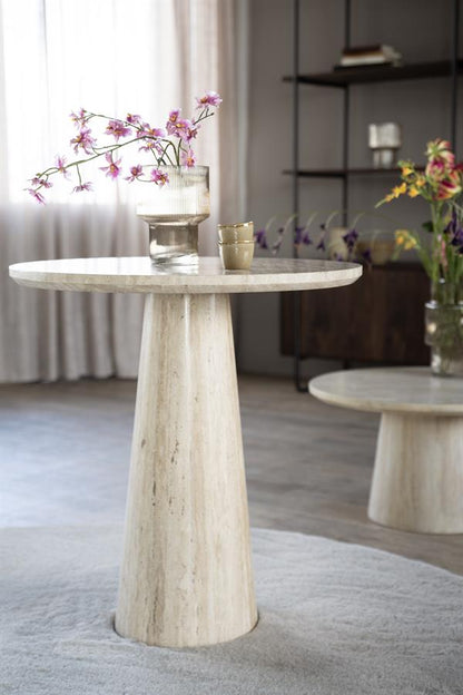 Eettafel Aime beige travertin, vooraanzicht in een interieur