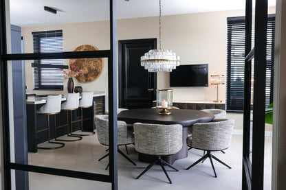 Eetkamerstoel Cheyenne grijs stof in een interieur