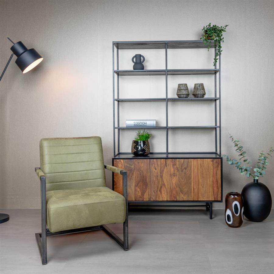 Fauteuil Rocca bullstof groen in een interieur