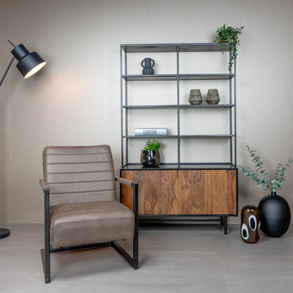 Fauteuil Rocca bullstof bruin in een interieur