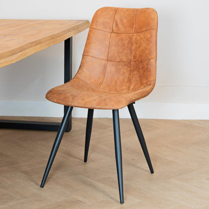 Eetkamerstoel Peak cognac, vooraanzicht in een interieur