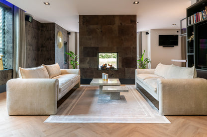 Salontafel La Cantera naturel travertin set van 2 in een interieur