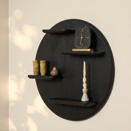 Wandmeubel Lena zwart mangohout, vooraanzicht in een interieur