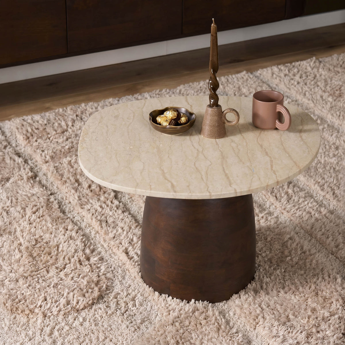 Salontafel Liv bruin mangohout 80 cm in een interieur