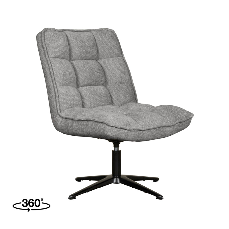 Fauteuil Vince grijs stof, schuin vooraanzicht op witte achtergrond