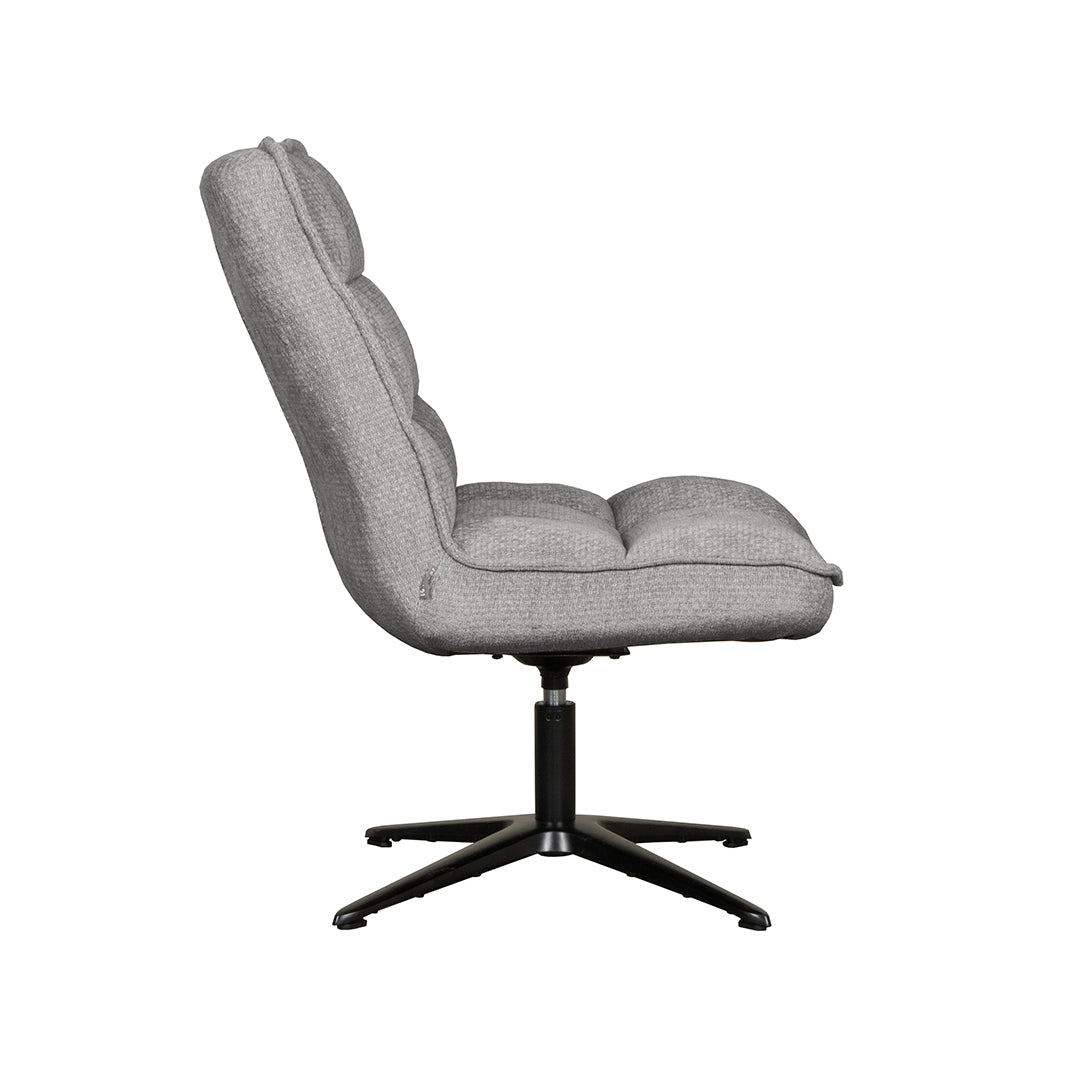 Fauteuil Vince grijs stof, zijaanzicht op witte achtergrond