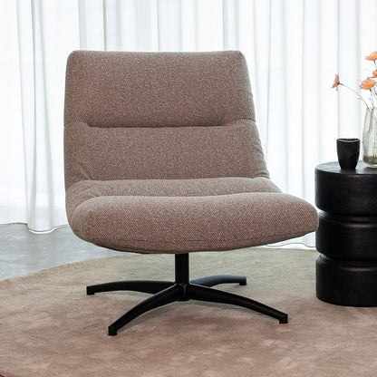 Fauteuil Calix grijs bouclé, vooraanzicht in een interieur