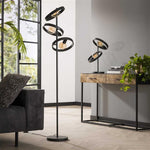 Vloerlamp Hover zwart, vooraanzicht in een interieur