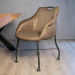 groene eetkamerstoel met wieltjes 